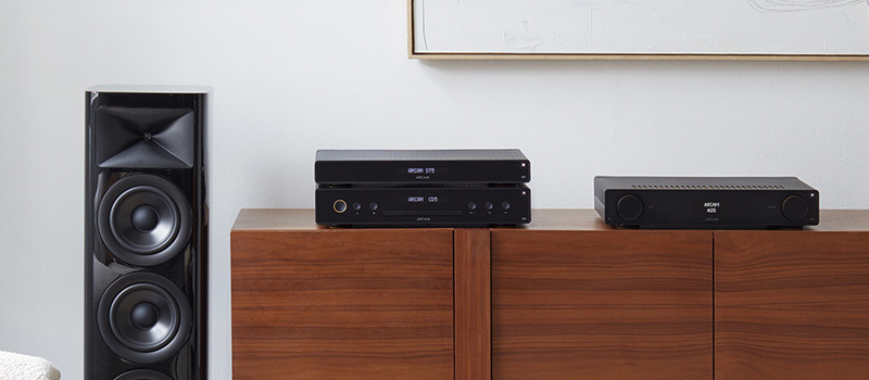Arcam Hi-Fi on wooden cabinet